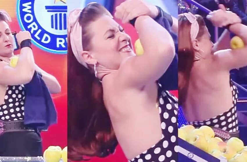 Biceps-ஐ வைத்து பழங்களை உடைக்கும் சாதனைப் பெண் !!!